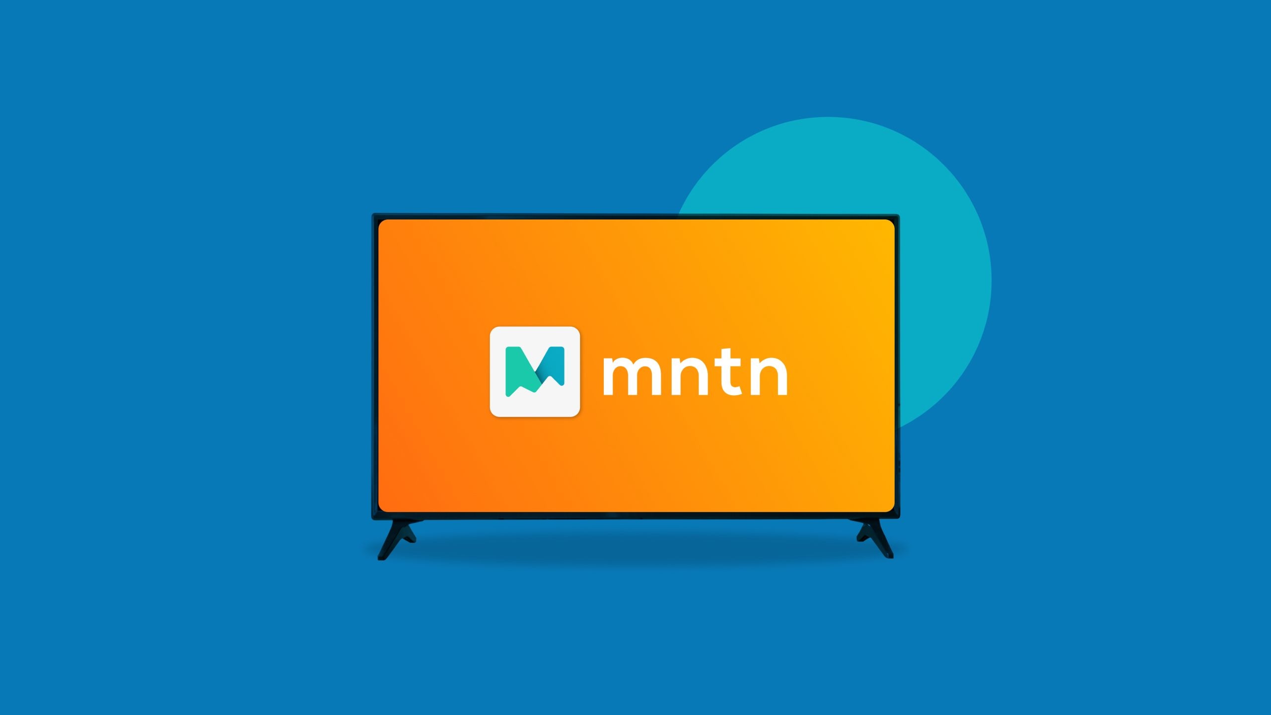 A television screen displaying the MNTN logo on an orange background.